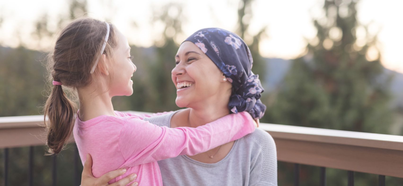 woman cancer survivor and child