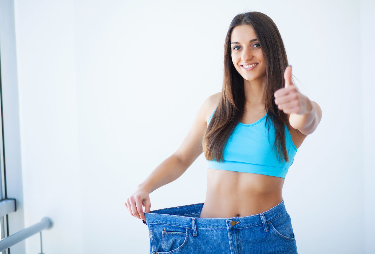 A women look happy with Weight Loss