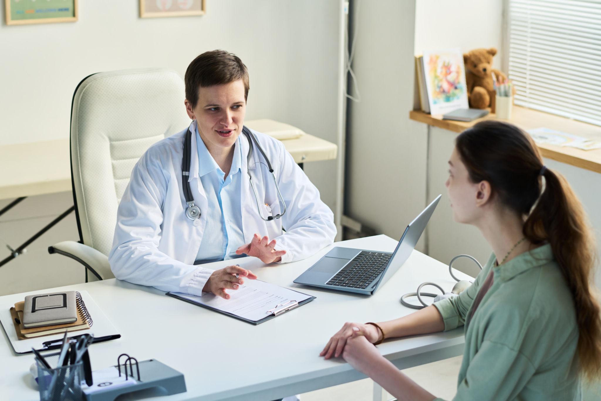 Doctor consulting a patient about ivermectin treatment and its approved uses for humans in Australia.